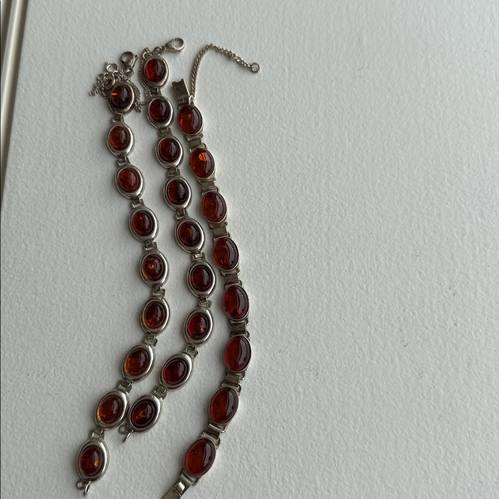 3 Silver and Amber Women's bracelets priced for the three items